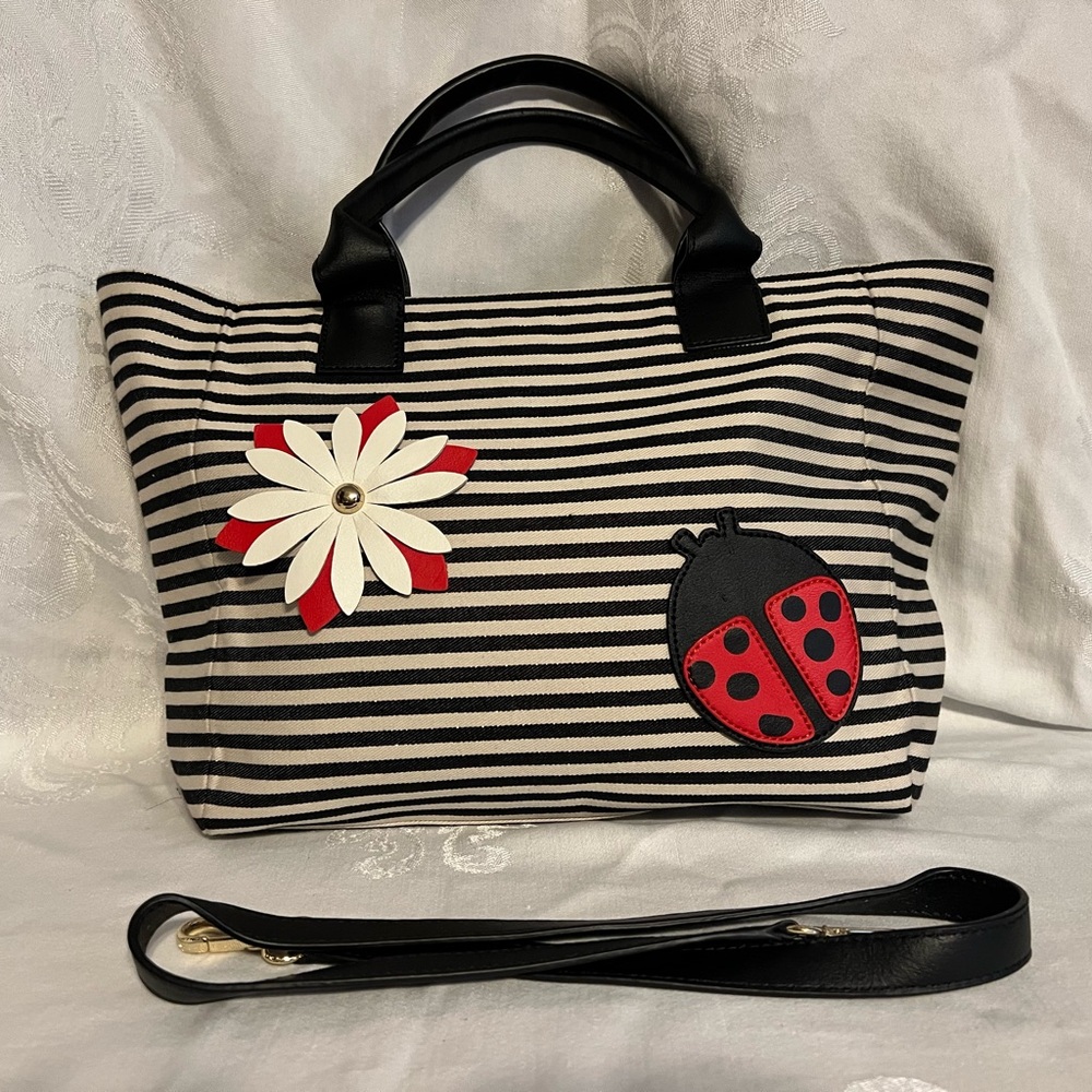 Talbots black and cream striped canvas tote with leather flower and ladybug